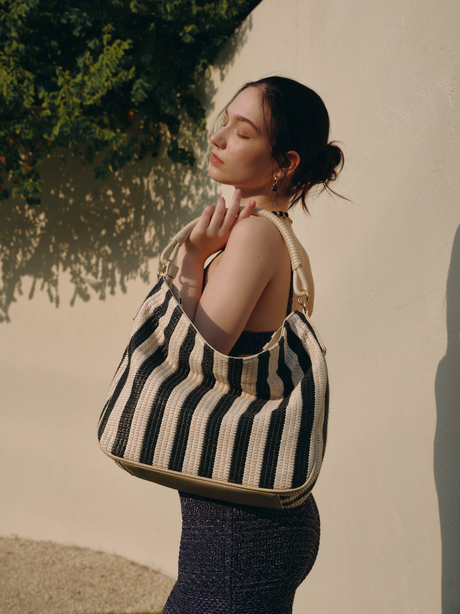 Sophisticated Striped Hobo Bag with Elegant Shoulder Strap