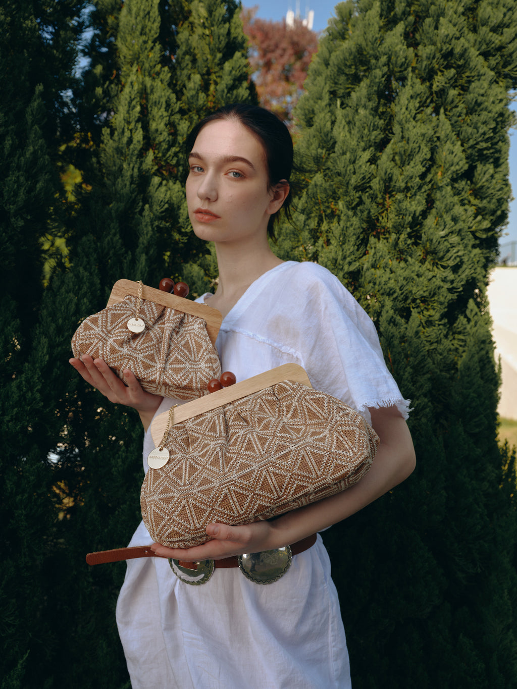 KASSANDRA Elegant Textured Fabric Clutch with Wooden Frame
