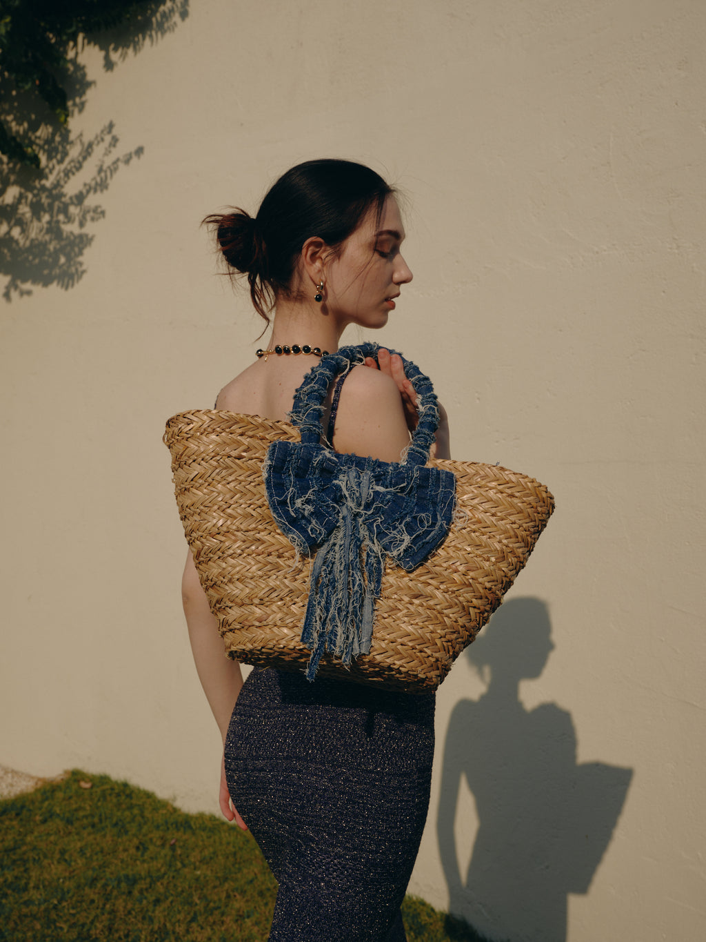 KASSANDRA Denim Bow Accent Straw Tote Bag