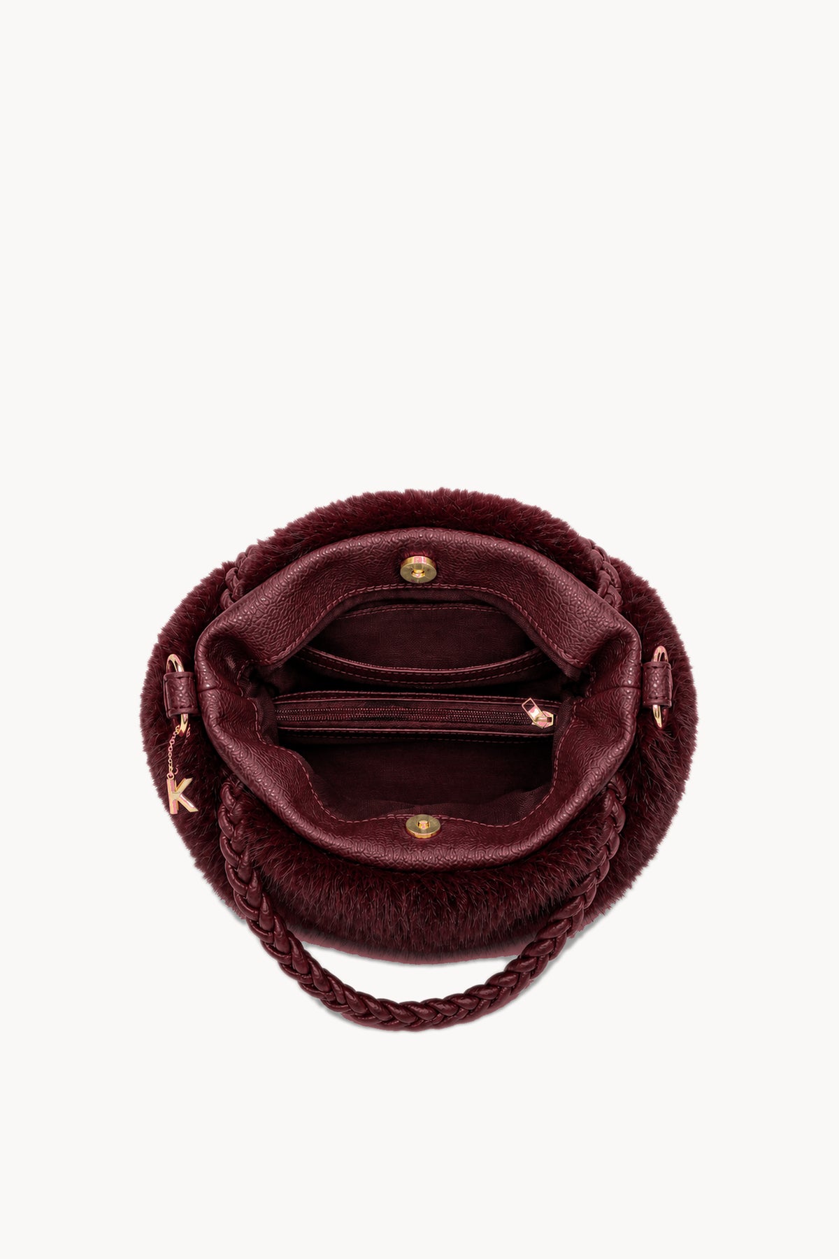Kassandra & Co Borsa hobo effetto pelliccia con manico intrecciato