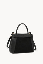 Kassandra & Co Borsa a mano effetto scamosciato con fascia decorativa