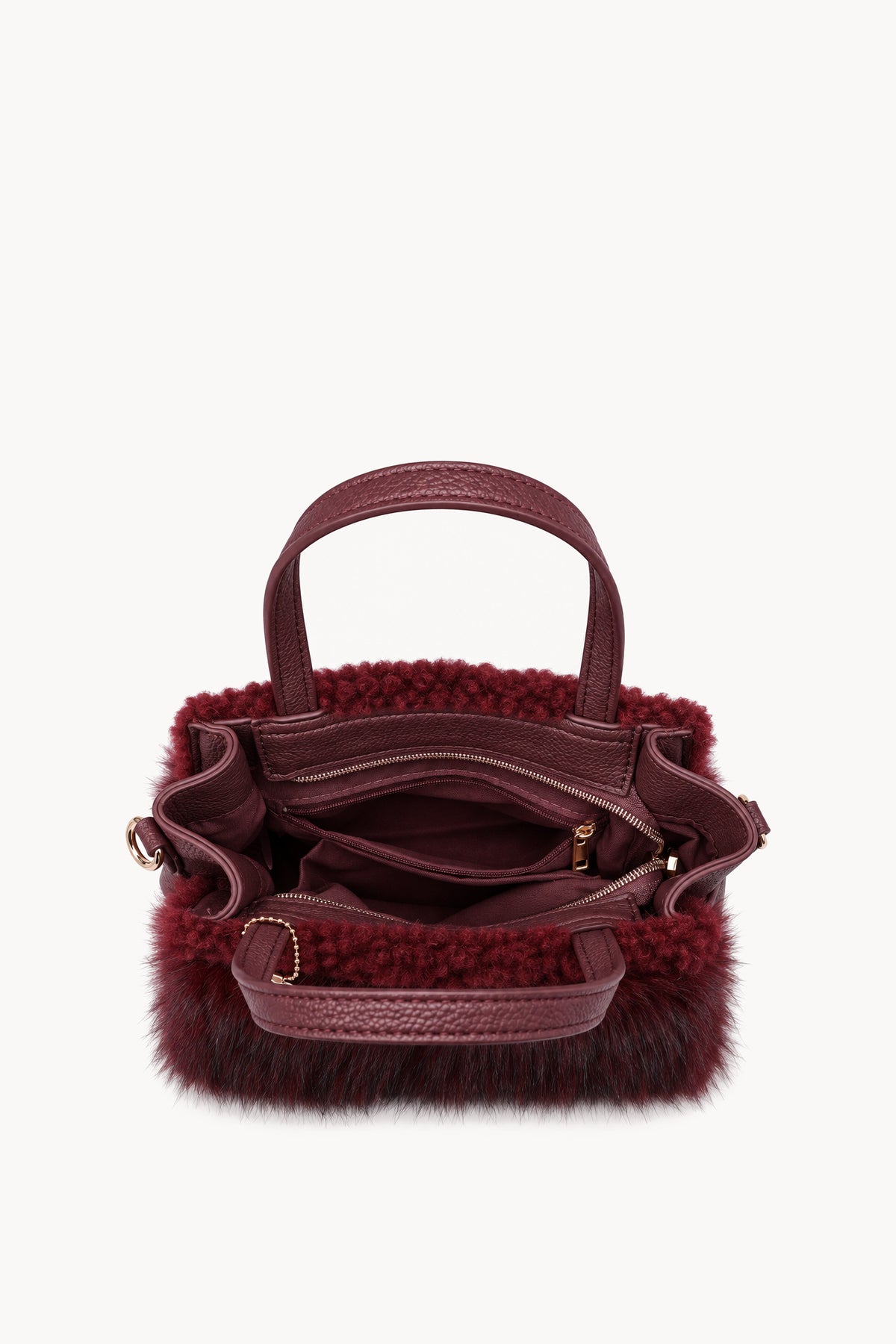 Borsa a mano effetto pelliccia con cinturino